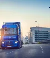 E-Tech T driving in the sunset